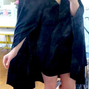 Tight black dress. With cloak sleeves. Size small. Never worn. From Shein.